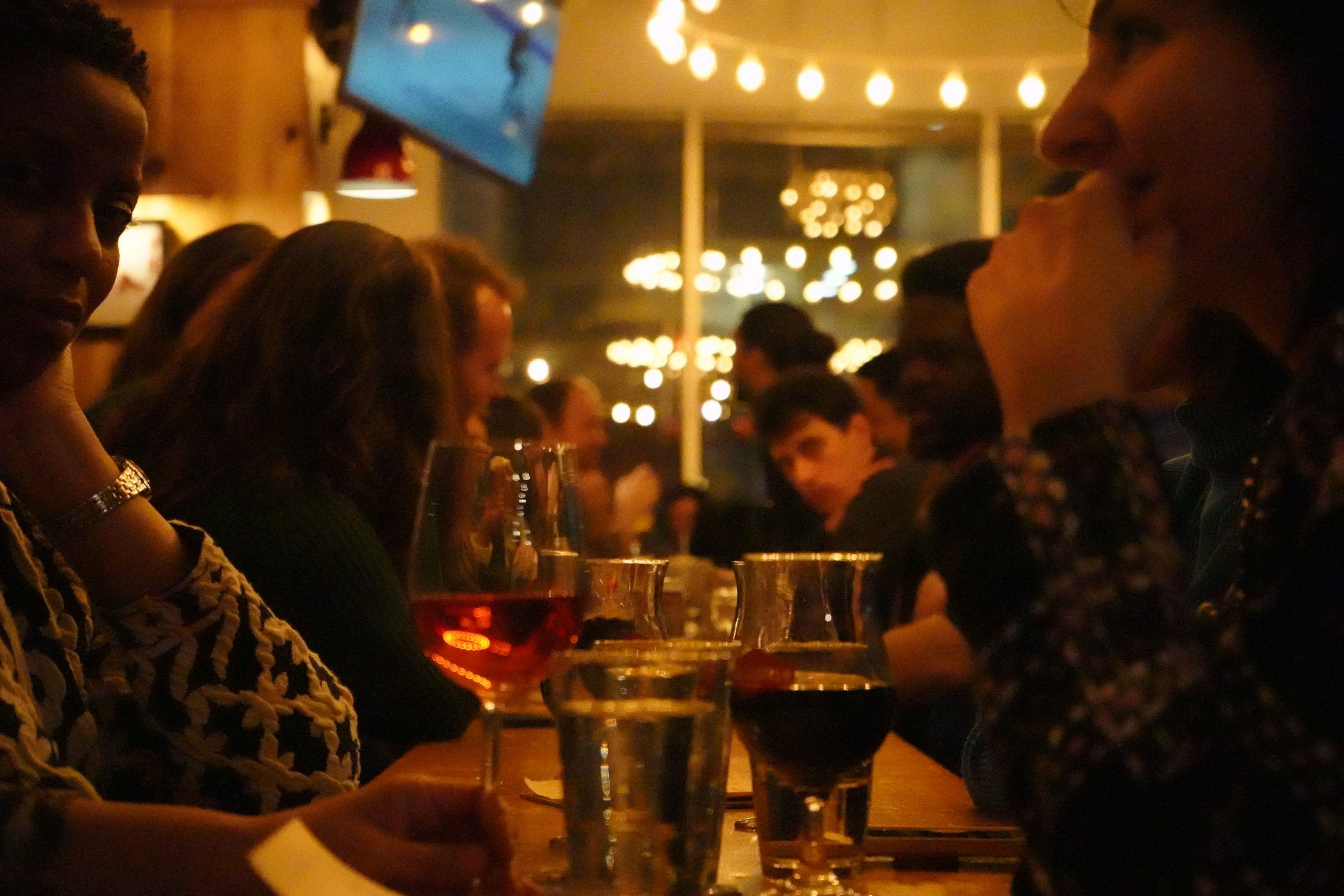 View down a long table as Carmine Leggett looks on.